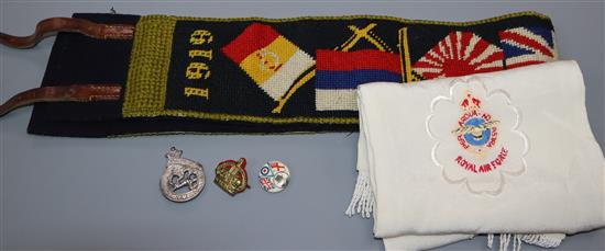 An RAF pilots scarf, a belt and assorted badges